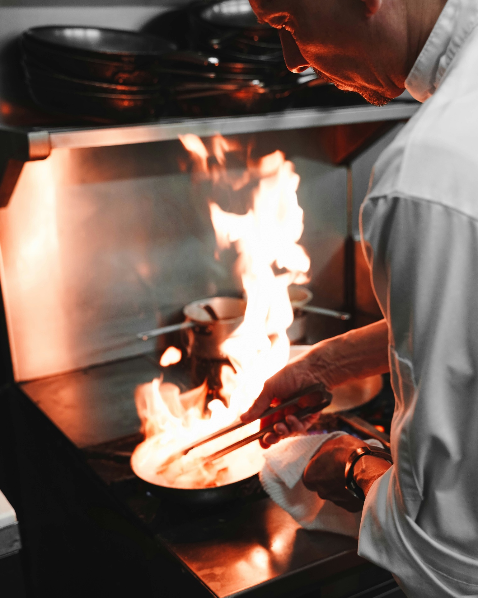 Chef searing in the FuelOS kitchen